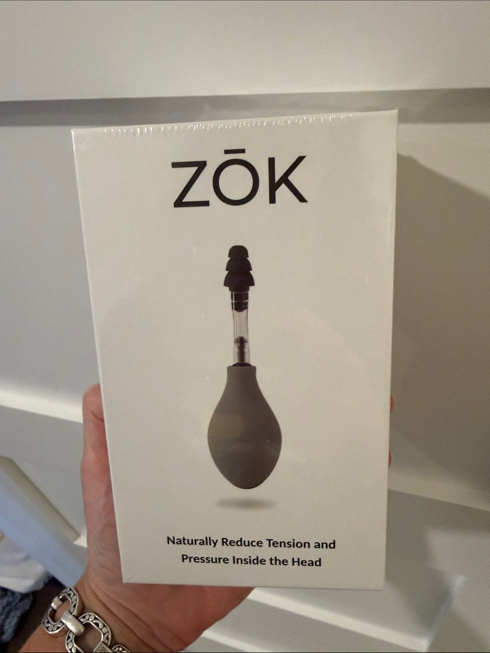 Head Pressure Relief Device - Gray still in sealed package